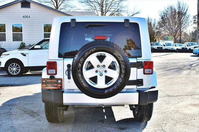 used 2011 Jeep Wrangler Unlimited car, priced at $23,995