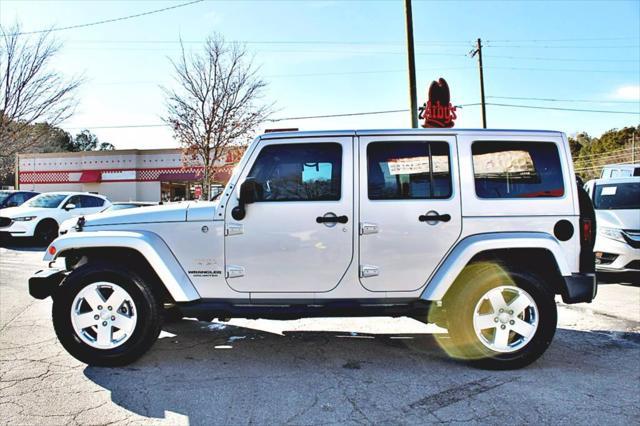 used 2011 Jeep Wrangler Unlimited car, priced at $23,995