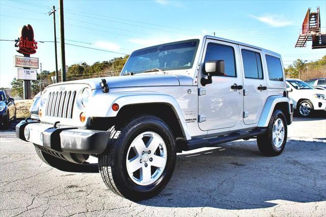 used 2011 Jeep Wrangler Unlimited car, priced at $23,995