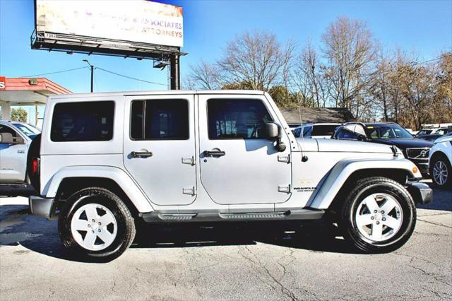 used 2011 Jeep Wrangler Unlimited car, priced at $23,995