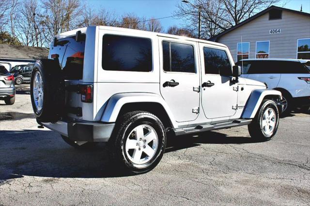 used 2011 Jeep Wrangler Unlimited car, priced at $23,995