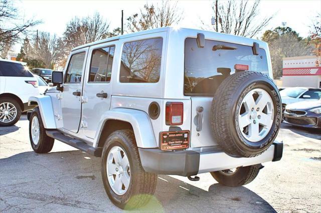 used 2011 Jeep Wrangler Unlimited car, priced at $23,995