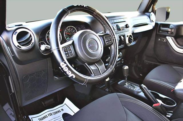 used 2015 Jeep Wrangler Unlimited car, priced at $18,495