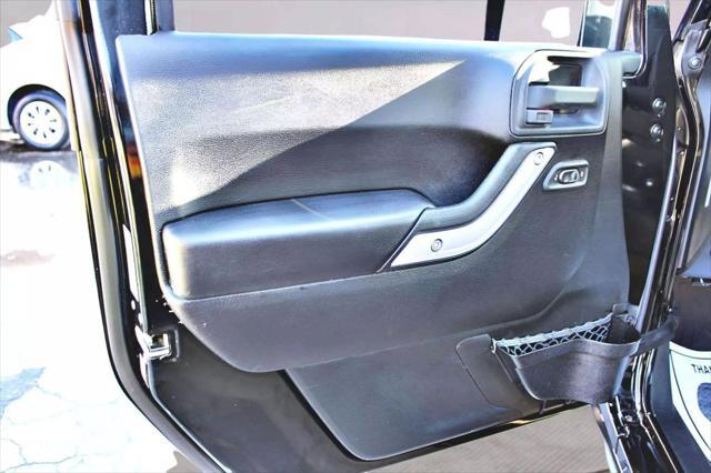 used 2015 Jeep Wrangler Unlimited car, priced at $18,495