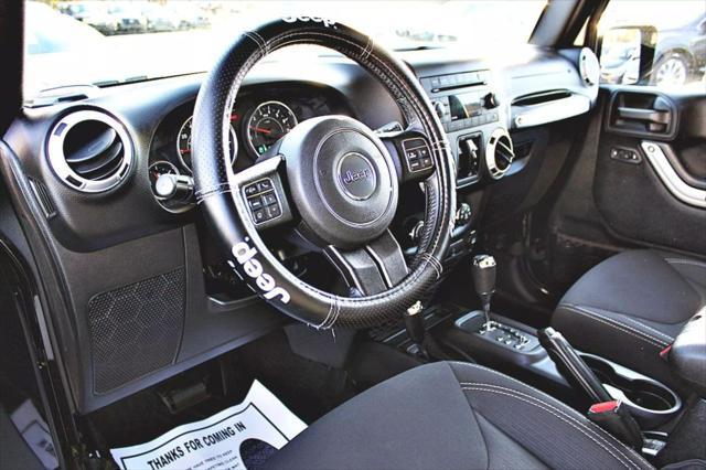 used 2015 Jeep Wrangler Unlimited car, priced at $18,495