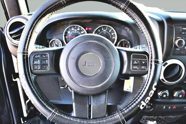 used 2015 Jeep Wrangler Unlimited car, priced at $18,495