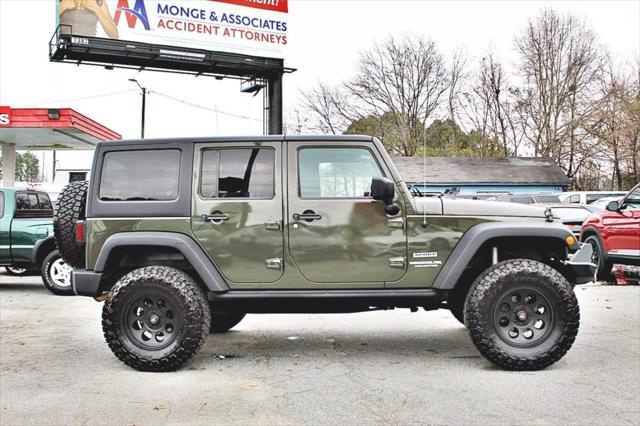 used 2015 Jeep Wrangler Unlimited car, priced at $19,493