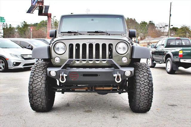 used 2015 Jeep Wrangler Unlimited car, priced at $19,493