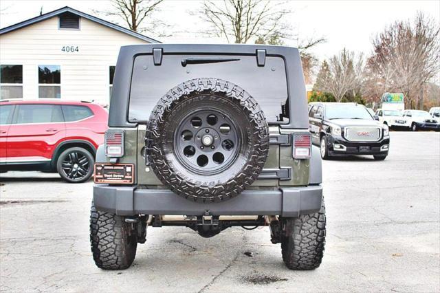 used 2015 Jeep Wrangler Unlimited car, priced at $19,493