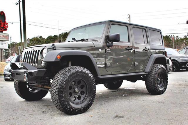 used 2015 Jeep Wrangler Unlimited car, priced at $19,493