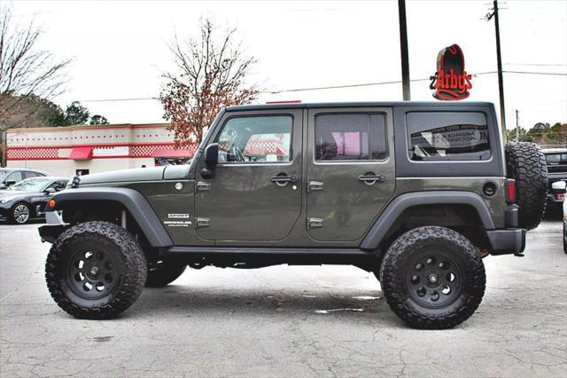 used 2015 Jeep Wrangler Unlimited car, priced at $19,493