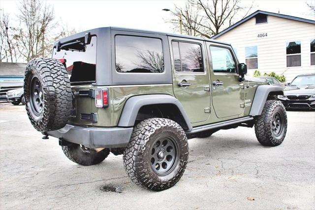 used 2015 Jeep Wrangler Unlimited car, priced at $19,493