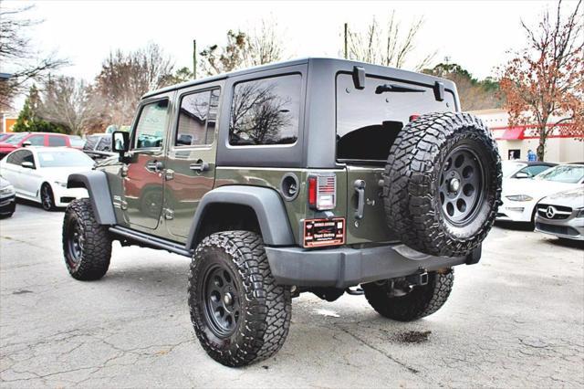 used 2015 Jeep Wrangler Unlimited car, priced at $19,493