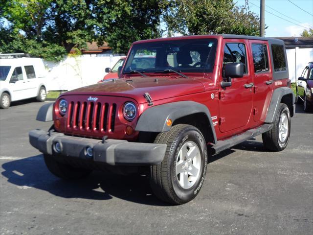 used 2013 Jeep Wrangler Unlimited car, priced at $14,295