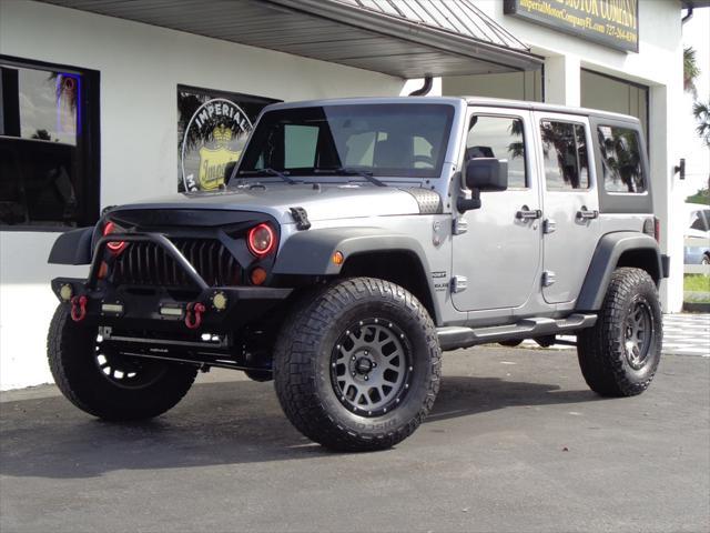 used 2015 Jeep Wrangler Unlimited car, priced at $18,495