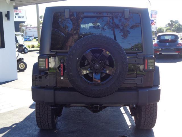 used 2014 Jeep Wrangler Unlimited car, priced at $18,495