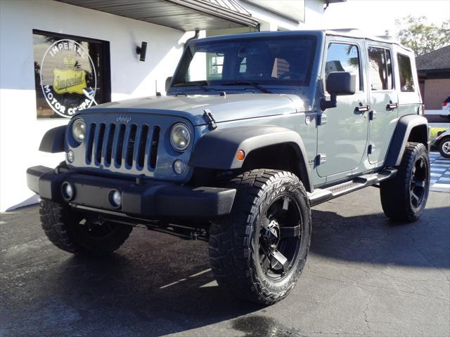 used 2014 Jeep Wrangler Unlimited car, priced at $16,995