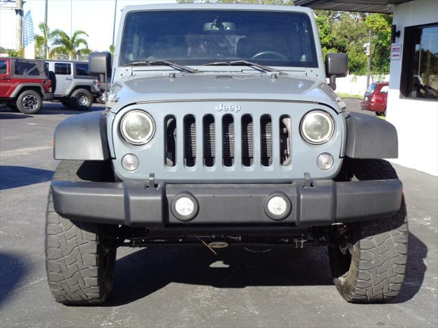 used 2014 Jeep Wrangler Unlimited car, priced at $16,995