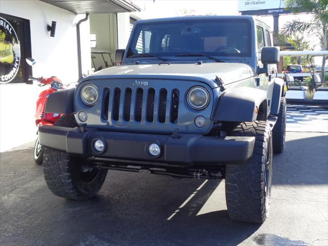 used 2014 Jeep Wrangler Unlimited car, priced at $16,995