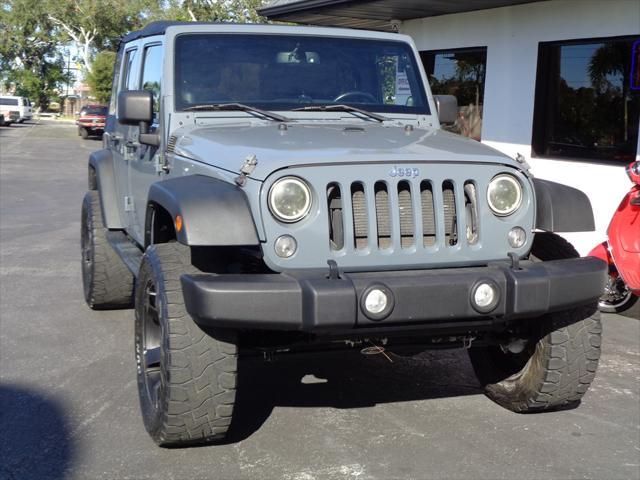 used 2014 Jeep Wrangler Unlimited car, priced at $16,995