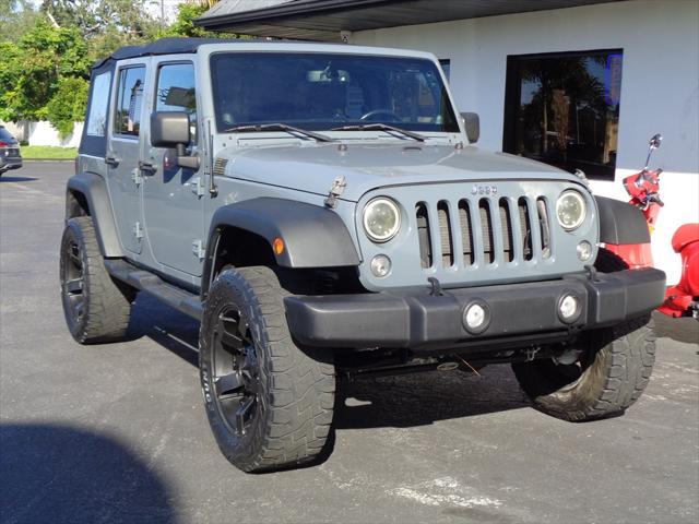 used 2014 Jeep Wrangler Unlimited car, priced at $16,995