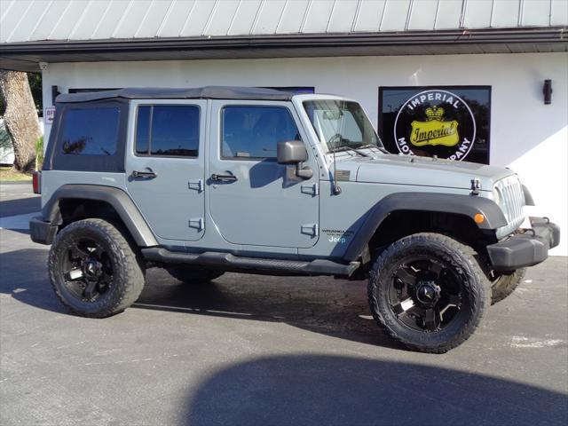 used 2014 Jeep Wrangler Unlimited car, priced at $16,995