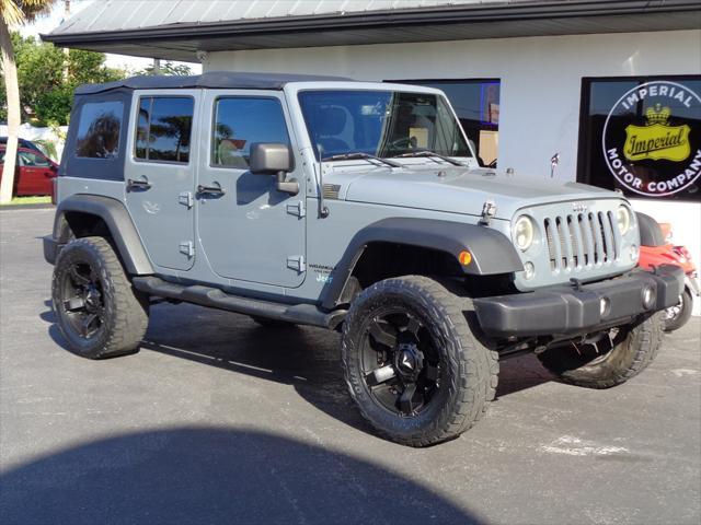 used 2014 Jeep Wrangler Unlimited car, priced at $16,995