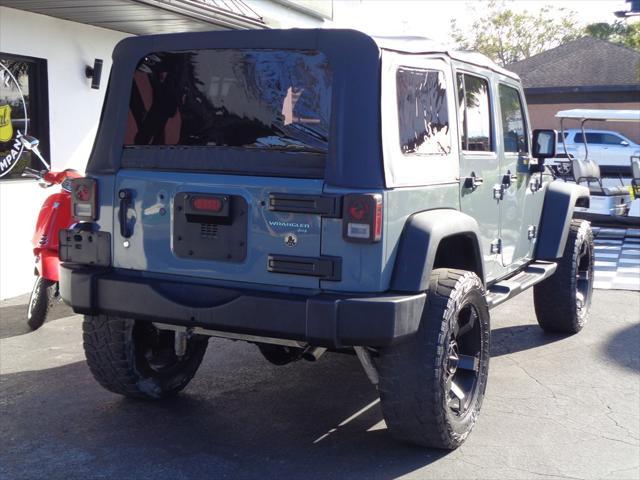 used 2014 Jeep Wrangler Unlimited car, priced at $16,995