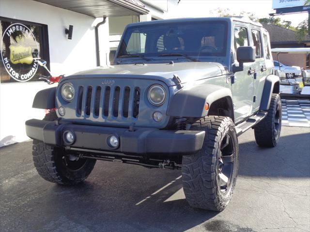 used 2014 Jeep Wrangler Unlimited car, priced at $16,995