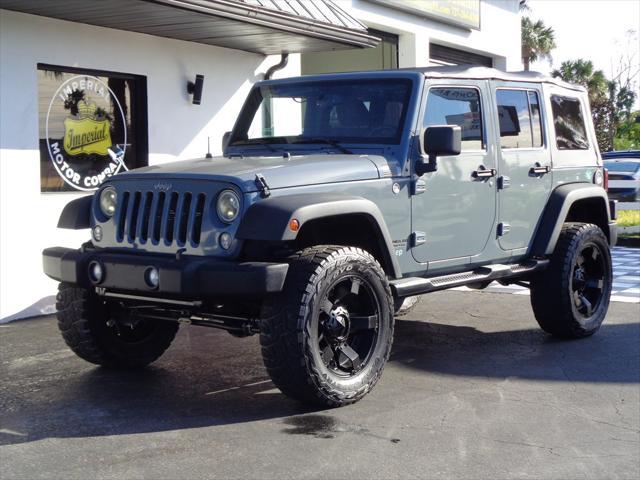 used 2014 Jeep Wrangler Unlimited car, priced at $16,995