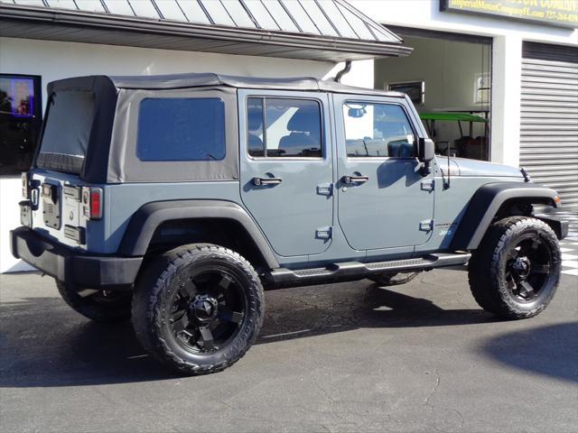 used 2014 Jeep Wrangler Unlimited car, priced at $16,995