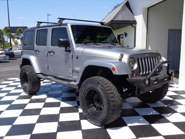 used 2013 Jeep Wrangler Unlimited car, priced at $16,495