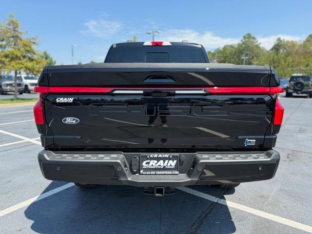 new 2025 Ford F-150 Lightning car, priced at $74,990