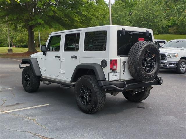 used 2016 Jeep Wrangler Unlimited car, priced at $19,522