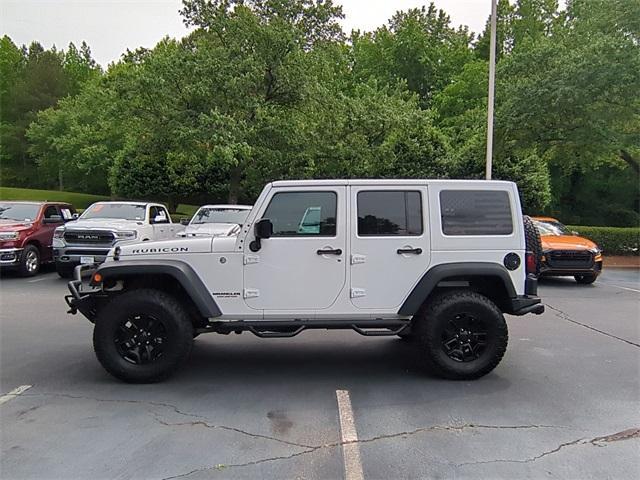 used 2016 Jeep Wrangler Unlimited car, priced at $19,522
