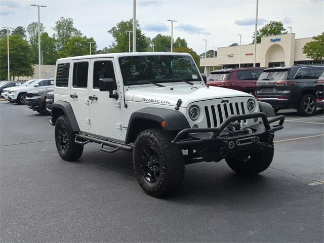 used 2016 Jeep Wrangler Unlimited car, priced at $19,522