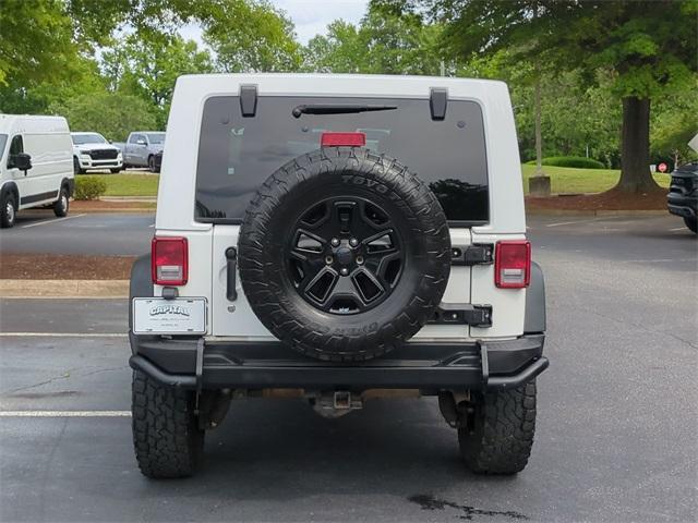 used 2016 Jeep Wrangler Unlimited car, priced at $19,522