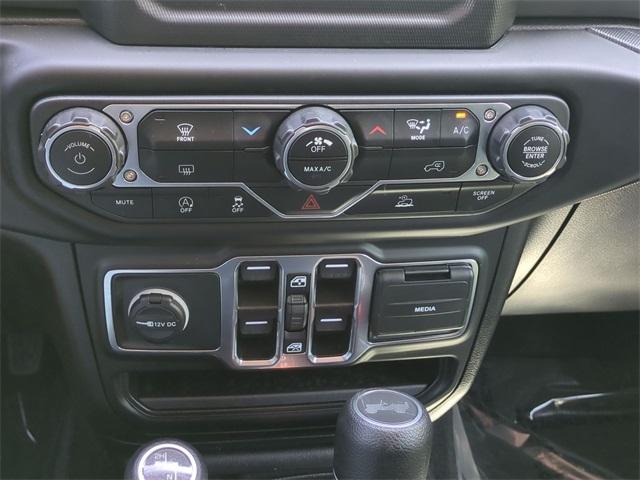 used 2023 Jeep Wrangler car, priced at $38,492