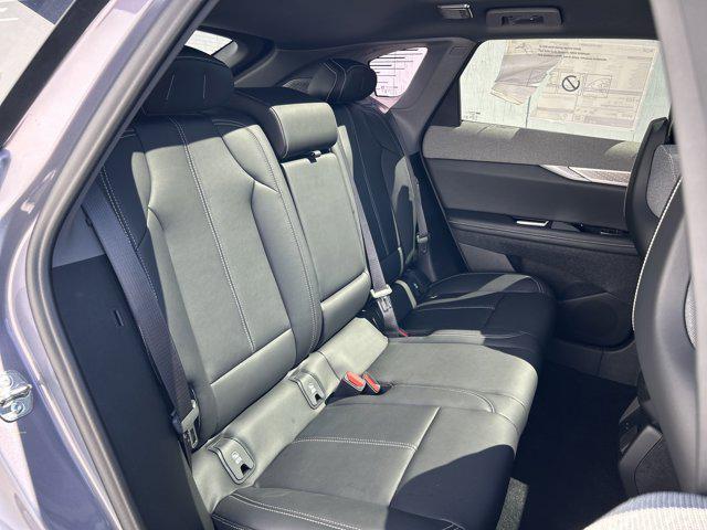 new 2025 Cadillac OPTIQ car, priced at $55,015