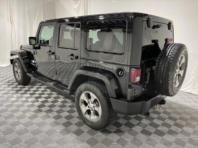 used 2016 Jeep Wrangler Unlimited car, priced at $21,700