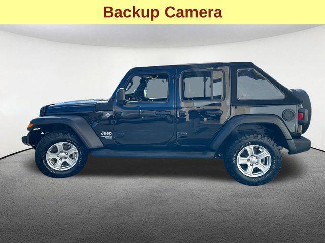 used 2021 Jeep Wrangler Unlimited car, priced at $30,877