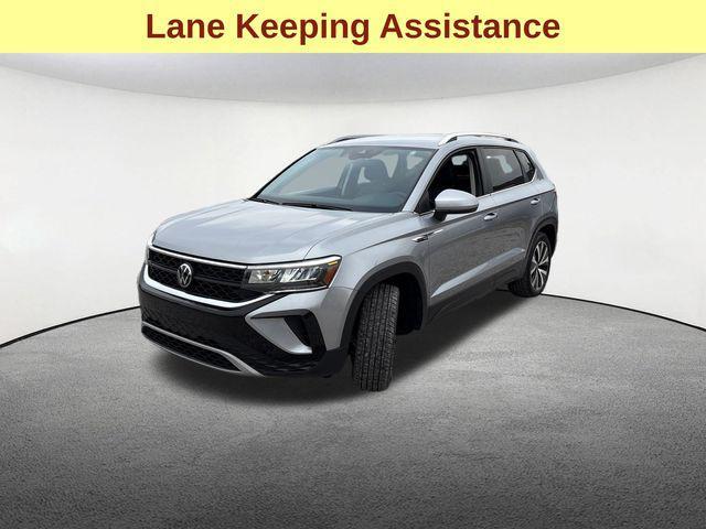 used 2024 Volkswagen Taos car, priced at $22,977