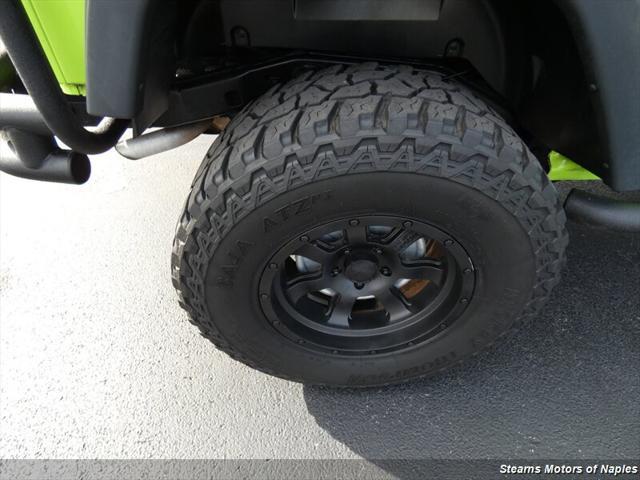 used 2013 Jeep Wrangler Unlimited car, priced at $15,998