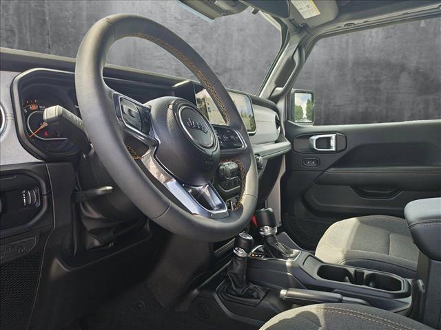 used 2024 Jeep Wrangler car, priced at $49,858