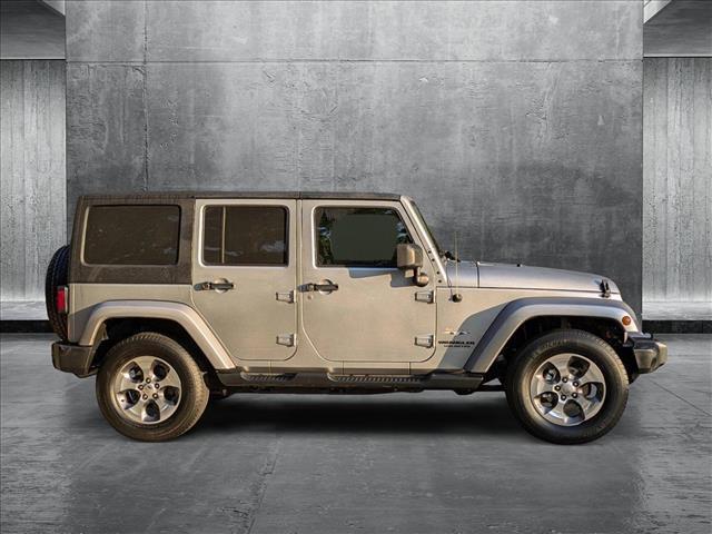 used 2016 Jeep Wrangler Unlimited car, priced at $21,855