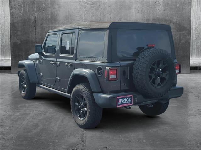 used 2022 Jeep Wrangler Unlimited car, priced at $28,158