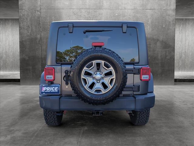 used 2017 Jeep Wrangler Unlimited car, priced at $25,127