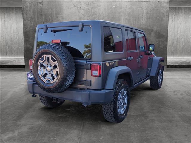 used 2017 Jeep Wrangler Unlimited car, priced at $25,127