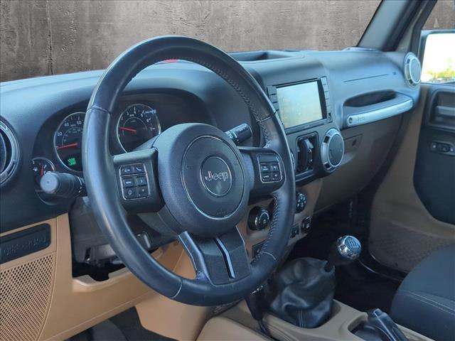 used 2017 Jeep Wrangler Unlimited car, priced at $25,127