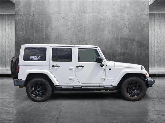 used 2014 Jeep Wrangler Unlimited car, priced at $15,588
